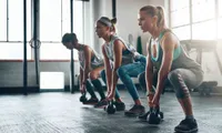 three women working out
