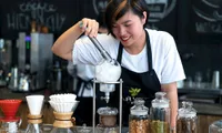 Woman Preparing coffee