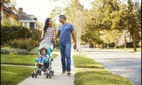 Family walking in neighborhood