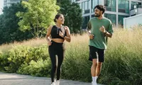 couple running together outdoors
