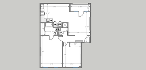 Modern 2D floor plan illustrating a spacious 2-bedroom apartment with a cozy living area, well-equipped kitchen, and efficient bathrooms, ideal for comfortable living.