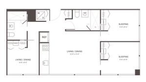 Modern apartment floor plan featuring a spacious living/dining area, two cozy sleeping quarters, a functional kitchen with a refrigerator, and in-unit washer/dryer.