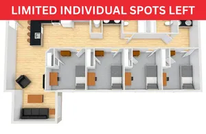 Modern apartment floor plan featuring four cozy bedrooms, a spacious living area, and a sleek kitchen with an island. Limited individual spots left for this stylish layout.