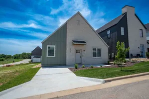 Owen-Silos-Subdivision-South-Springfield-Missouri-The-Watts-5731-Two-Bedroom-Home-Front-Patio-And-Driveway