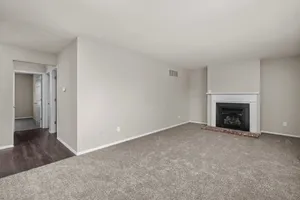 2 Bed Garden Remodel with Fireplace | Living & Dining Space  | Woods Mill Park Apartments & Townhomes in Chesterfield, MO