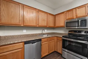 2 Bed Garden Partial Remodel with Fireplace | Kitchen Interior  | Woods Mill Park Apartments & Townhomes in Chesterfield, MO