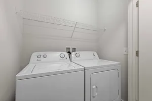 In-unit washer and dryer in modern two-bedroom apartment at The Ave Apartments Clintonville Columbus OH