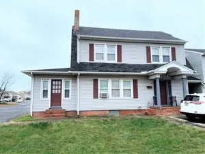 Spacious 2 bedroom 1 bath apartment on the ground level. Updated bathroom, eat in kitchen and shared Washer/Dryer. Plenty of parking infront of the apartment. Gas heat, Central AC, quarterly water/sewage and trash bill.