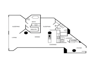 Floor plan of an apartment with two bedrooms, 2 bathrooms, foyer, living area, dining area, and kitchen.