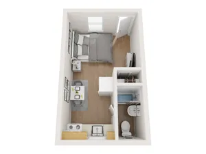 Charming studio apartment floor plan featuring a cozy bedroom area, compact bathroom, efficient kitchenette, and dining space with elegant wooden flooring.