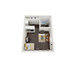 Compact studio floor plan with integrated living area, bedroom space, kitchen, and bathroom.