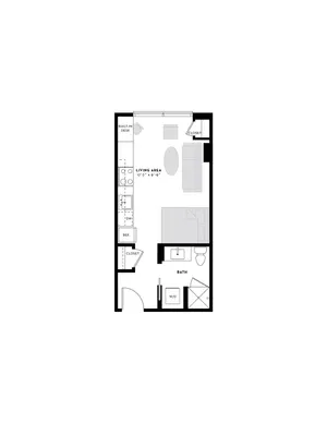 Modern floor plan showcasing a stylish studio apartment with an open-concept living area, built-in desk, cozy sleeping space, and a full bathroom.