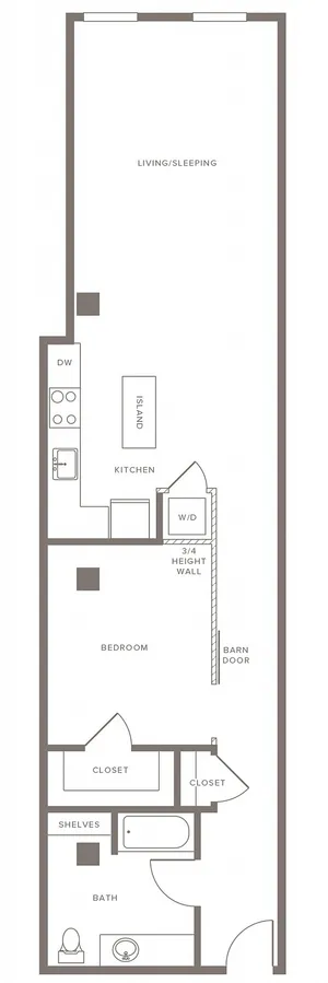 Modern apartment floor plan featuring open living/sleeping area, spacious kitchen with island, cozy bedroom with barn door, and contemporary bathroom layout.