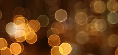 Enchanting display of golden bokeh lights creating a warm, inviting atmosphere.