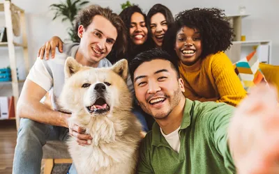 Pet-friendly community at The View at Cedar Park apartments in Cedar Park, TX - friends with dog in modern apartment