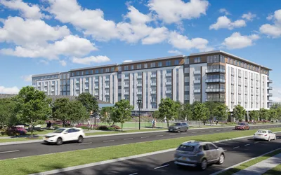 Modern apartment complex with sleek architecture, surrounded by lush green landscaping and a vibrant urban scene.