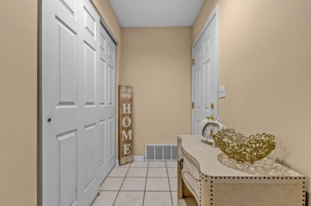 Entry and Mud Room from Attached 2-Car Garage at Apartment Homes for rent in Williamsville | StoneGate Apartment Homes