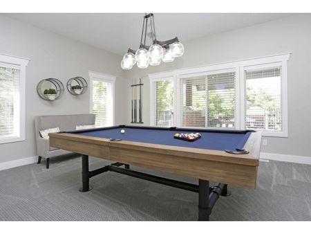 Game room with billiards table