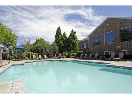 Rectangular pool with 10 tanning chairs
