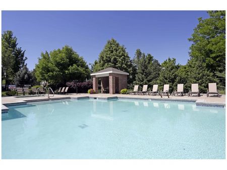 Rectangular pool in front of square hot tub