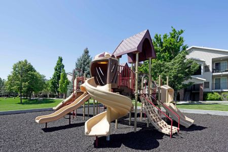 Playground with 4 slides and climbing structure