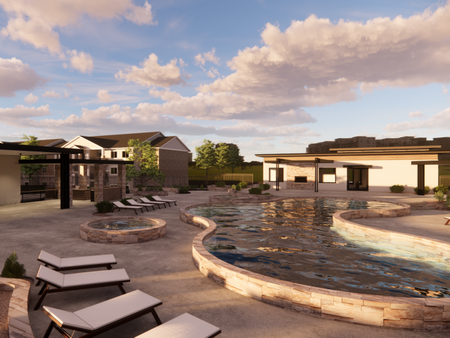 Alternaate view of modern swimming pool surrounded by lounge chairs and beautiful landscaping. Area has 2 visible hot tubs and access to the lounging/grilling station