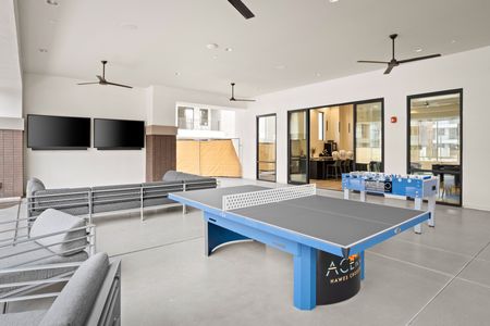 Acero Hawes Crossing - Amenity Rich Apartment Living - Outdoor Game and Lounge Space