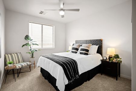 One, Two, and Three-Bedroom Apartments in Mesa, AZ - Acero Hawes Crossing - Bedroom with High Ceilings, White Bedding, and Nightstands