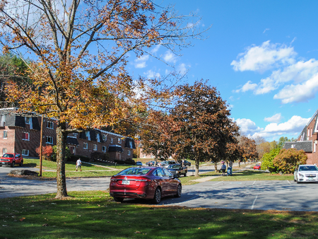 Parking area at Princeton Commons apartment community in Claremont, NH.