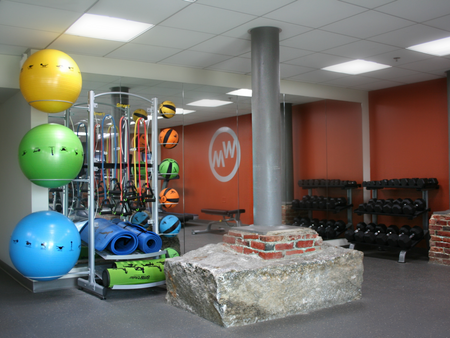 Exercise Equipment Including Yoga Mats, Weights, and Exercise Bands & Balls in Fitness Center | Washington Mill 240 | Lawrence, MA Apartments