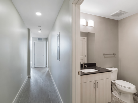 Hallway and Conventional Bathroom | Washington Mill 240 | Lawrence, MA Apartments