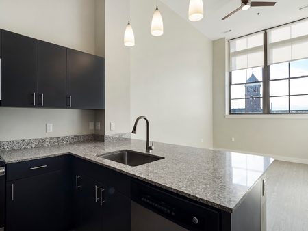 Kitchen and Inviting Dining Area | Washington Mill 240 | Lawrence, MA Apartments
