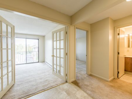 Classic French doors leading into living area  in apartment at at Westford Park apartments in Lowell, MA.