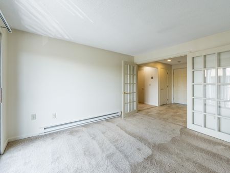 Elegant, spacious living area  in apartment at at Westford Park apartments in Lowell, MA.