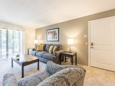 Light Infused Living Room  in apartment at Pheasant Run  | Nashua NH Apartments