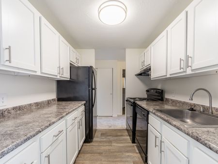 Upgraded Kitchens with white cupboards  in apartment at Pheasant Run  | Nashua NH Apartments