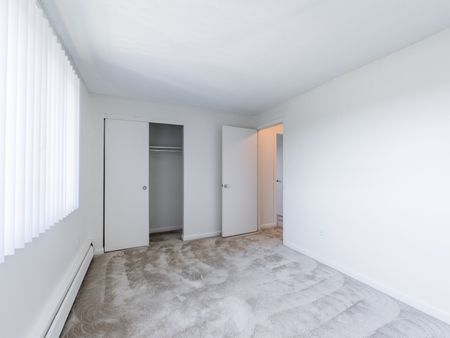 Spacious bedroom with closet space  in apartment at Pheasant Run  | Nashua NH Apartments
