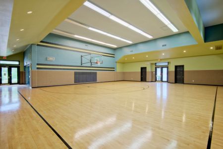 View of Indoor Sport Court, Showing Full-Size Basketball Court at Cottonwood Reserve Apartments