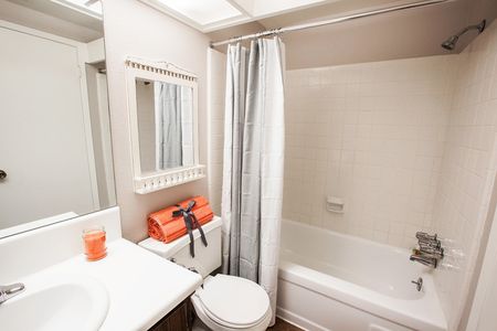 View of Bathroom, Showing Single Vanity, Toilet, and Tub at Fox Point in Old Farm Apartments