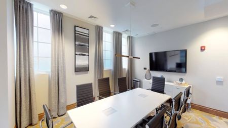 Conference Room with Wall Mounted Television