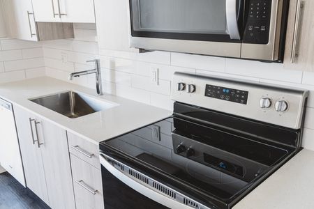 Modern kitchen with stainless steel appliances