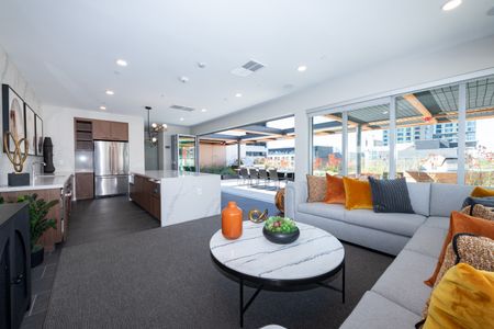 Modera Lake Merritt apartment homes in Oakland sky lounge with kitchen and seating area
