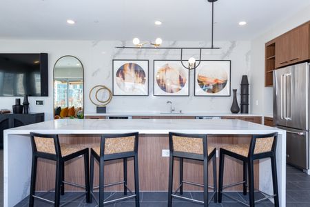 Modera Lake Merritt apartment homes in Oakland demonstration kitchen with island seating