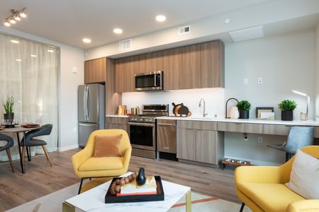 Modera Lake Merritt apartment homes in Oakland open floor plan with wood plank flooring and lots of natural light