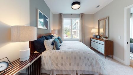 Spacious bedroom with oversized windows at Modera Old Ivy in Atlanta Georgia