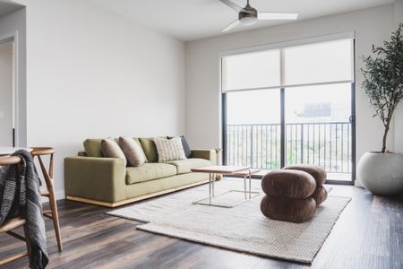 spacious living area with natural light at Modera Skylar apartments homes miami florida