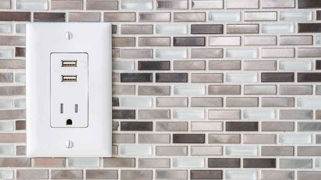 Wall outlet with USB plug ins in an apartment at Modera Mosaic.