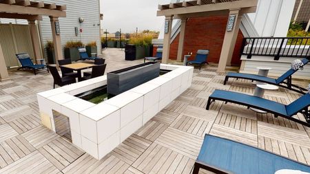 Fire Pit and Outdoor Seating on Rooftop Deck