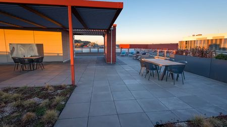 Rooftop deck with dining seating