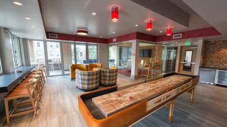 Shuffleboard and Social Seating in our Party Pod